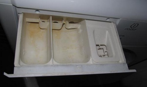 Лоток для порошку в пральній машині: як почистити