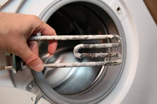 Накип в пральній машині: як очистити і запобігти появі
