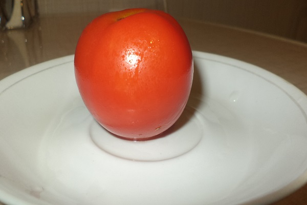 Характеристика і опис сорти томата Святковий