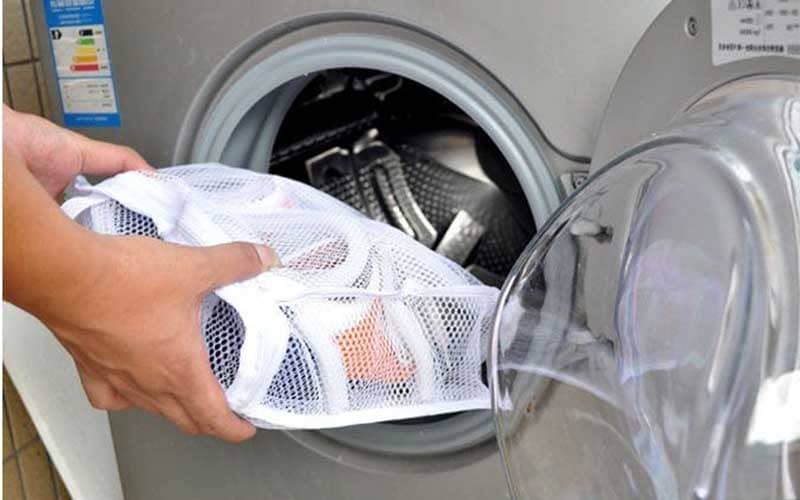 4 причини, чому пральна машина рве білизна при пранні. Усунення неполадок