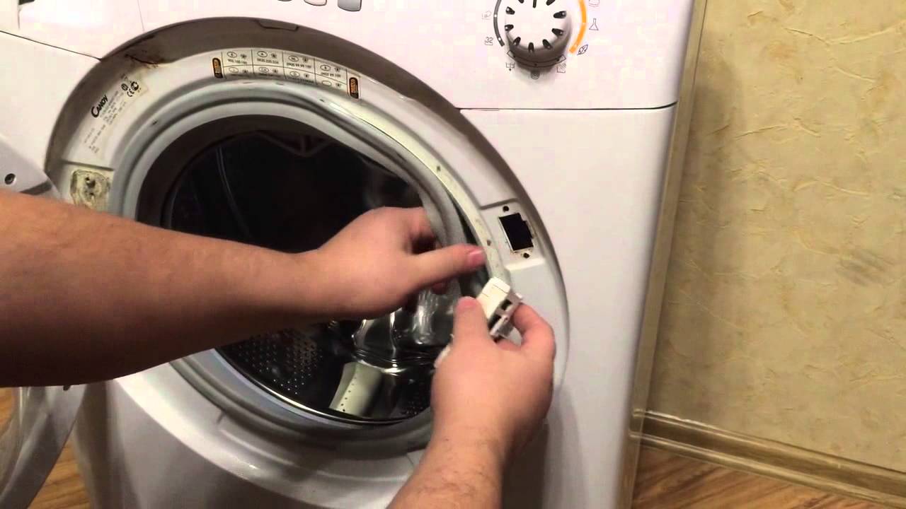Не відкривається двері пральної машини: пошук поломки