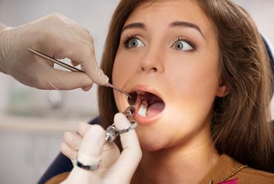 Знеболюючий укол при лікуванні зубів: що робити, якщо болить місце після видалення